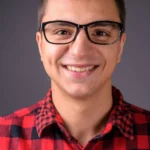 studio-shot-young-handsome-man-smiling-studio-shot-young-handsome-man-wearing-stylish-clothes-against-gray-background-130573399